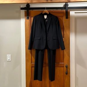 J Crew navy pin striped pant suit.  Size 2.  Flared leg.  Excellent condition